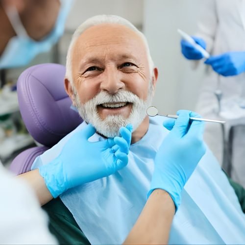 A patient smiling during a dental check-up